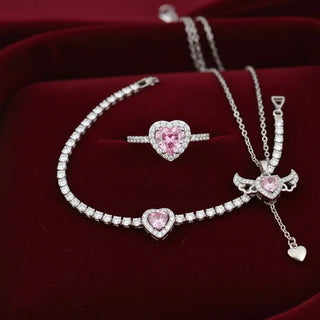 14 AYAR ALTIN KAPLAMA 3' LÜ SEVGİ MELEĞİ PEMBE KALP TAŞLI TAKI SETİ – KOLYE, YÜZÜK VE BİLEKLİK - Babil Takı